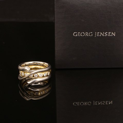 Regitze Overgaard for Georg Jensen: Magic ring, 
18kt Gold, 9 diamonds. Size: 53