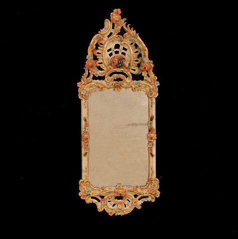 Original decorated Rococo mirror. Southgermany 
circa 1760. H: 91cm. W: 36cm