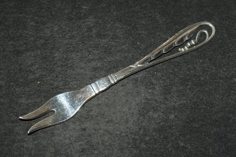 Ornamental serving fork # 42 Georg Jensen