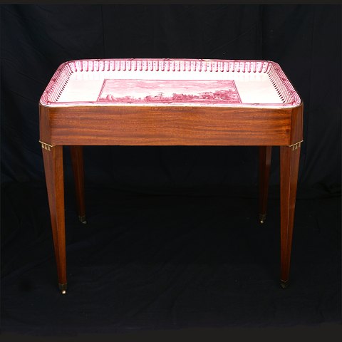 A Marieberg faience tray top-table. Sweden circa 
1765. H: 75,5cm. Tray: 61x90cm