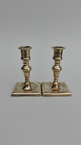 A pair of small baroque candlesticks Height 10.5cm