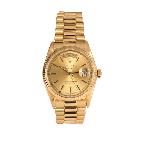 Rolex Day Date in 18kt gold. Full set with box, 
papers etc. Ref. 18238. D: 36mm. Bought 1989