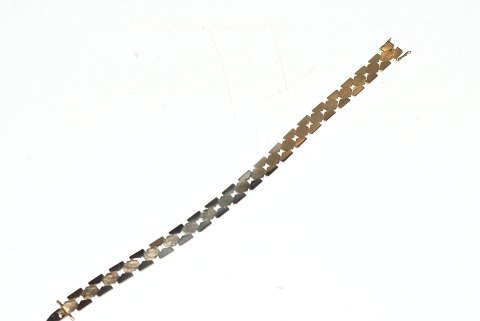 Columbine Bracelet with shavings, 14 Karat Gold
Stamped: 585, EHS