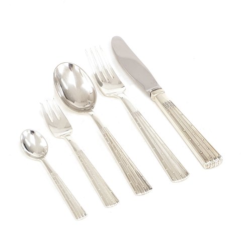 Jens Harald Quistgaard, Denmark: Champagne silver 
cutlery for 12 persons. (69)