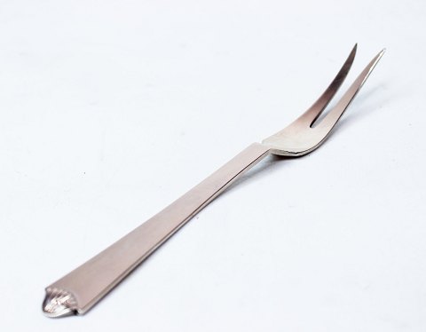 Carving fork in heritage silver no. 4 by Hans Hansen.
5000m2 showroom.