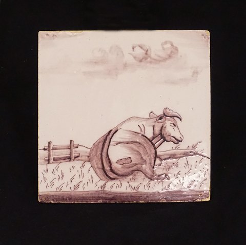 An early 19th century Dutch tile with a cow. Circa 
1800. Size: 13x13cm