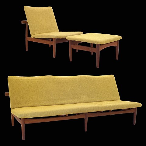 A Finn Juhl Japan Sofa and easychair with stool. 
Original upholstery. Produced by France and 
Daverkosen and with label