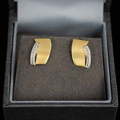 Earrings of 14k gold and white gold set with diamonds