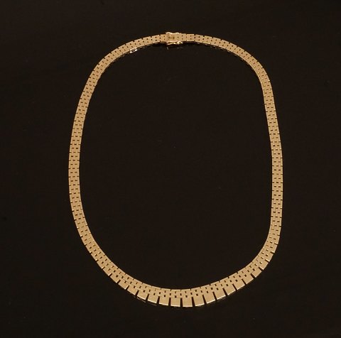A 14kt gold necklace. L: 42cm. W: 26,4gr