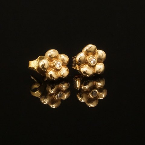 Ein Paar Ohrringe aus 14kt Gold. Ole Lynggaard, 
Kopenhagen. D: 8mm