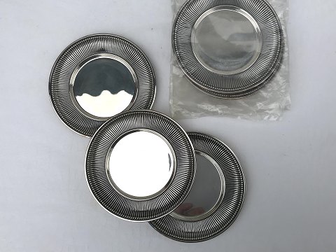 Silver Plate 
Coasters 
* 40 kr