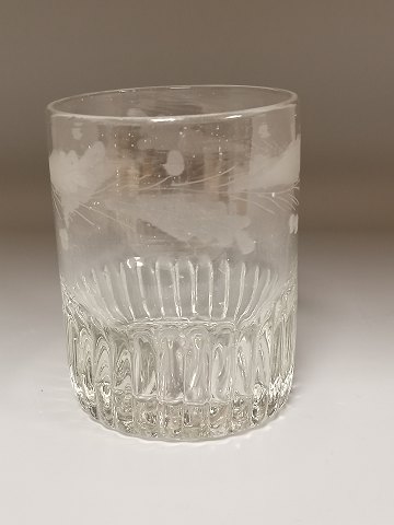 Blown fluted water glass with oak leaves