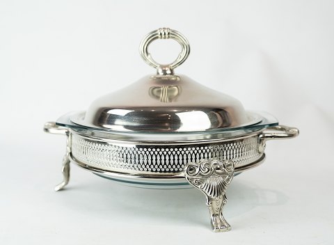 Silvered tureen with glass inside.
5000m2 showroom.