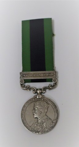 Indien-Medaille 1908-1935, North West Frontier 1930-31. Am Rand eingraviert 5909 
SEP DHAN SINGH. 2-1 PUNJAB R
