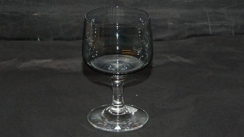 Hvidvinsglas#Atlantic Glas fra Holmegaard.
Designet af Per Lütken.
Højde 11,3 cm