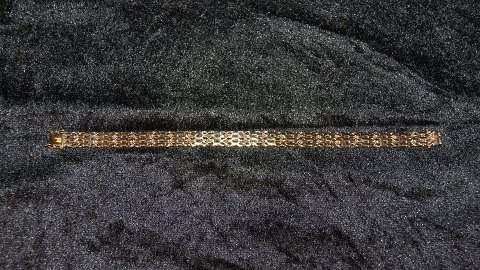 Elegant  Armbånd 14 karat Guld
Stemplet BH 585
Længde 19,7 Cm