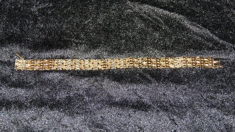 Elegant  Armbånd 14 karat Guld
Stemplet EEJ 585
Længde 19,5 Cm