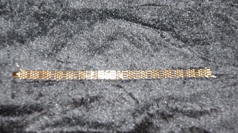 Elegant  Armbånd 14 karat Guld
Stemplet EEJ 585
Længde 19,5 Cm