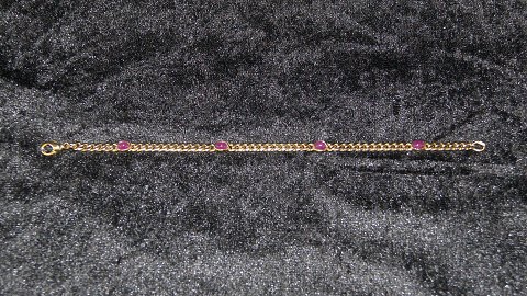 Elegant Panser armbånd med røde sten i 14 karat Guld
Stemplet  585
Længde 18,3 cm