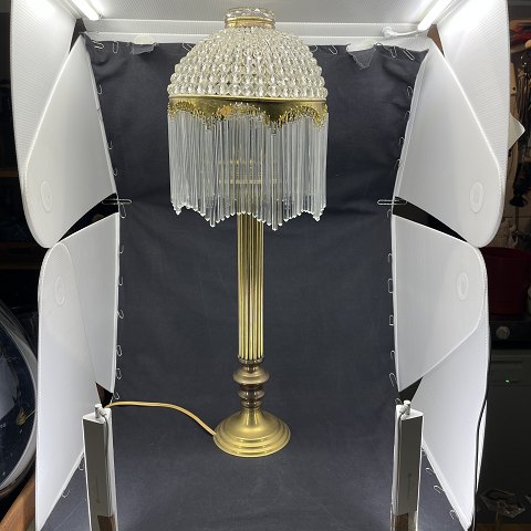 Art nouveau lamp with pearl shade and rods
