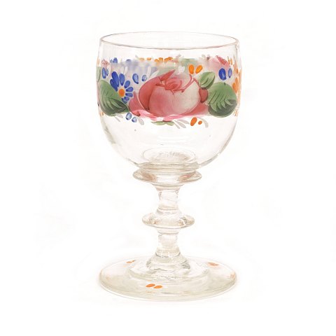 An enamel decorated wine glass. Circa 1860. H: 
11,9cm