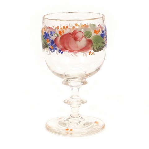 An enamel decorated wine glass. Circa 1860. H: 
12cm