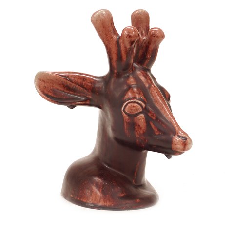 Axel Salto for Royal Copenhagen stoneware deer 
head with oxblood glaze. #20803. H: 31cm. L: 26cm
