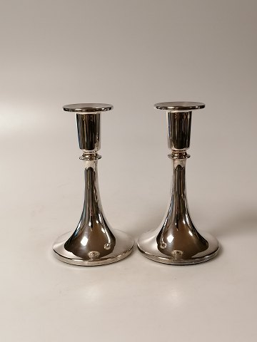 A pair of silver candlesticks of 830s