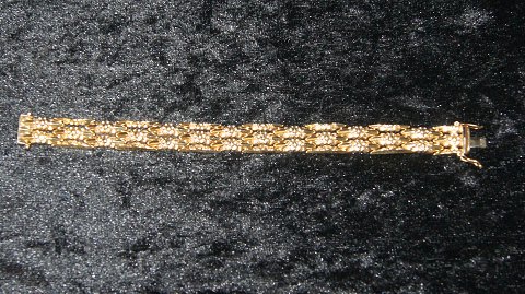 Elegant Armbånd i 18 karat Guld