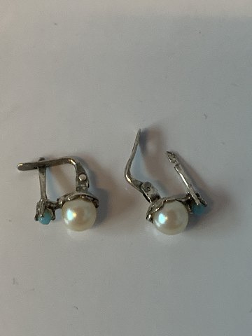 Øreringe med perle i sølv
Stemplet 925 s