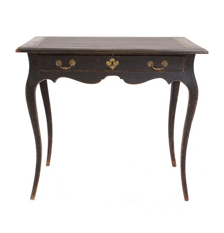 Black Rococo writing table with inset leather top. 
Sweden circa 1760. H: 74cm. Top: 85x60cm