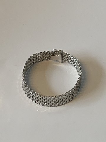 Bracelet in 14 carat white gold
Stamped 585
Thickness 1.86 mm approx
Length 18 cm cm
Width 14.69 mm
