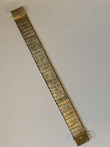 Bracelet in 14 carat gold
Stamped 585 BRD.N
From 1963-1996 The company Brdr. Nielsen
Length 19 cm approx
Width 18.54 mm approx
Thickness 1.69 mm