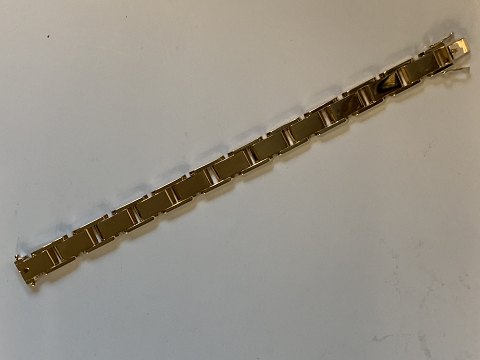 Blok Armbånd 3 RK i 14 karat Guld
Stemplet 585
Længde 17,8 cm ca
Brede 9,85 mm ca
Tykkelse 2,42 mm ca