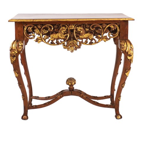 Richly carved and gilt Northeuropean Regence style 
console table. H: 84cm. Top: 100x56cm