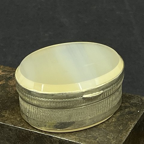 Oval pill box with white ribbon agat