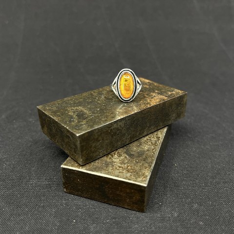 Ring with polished amber