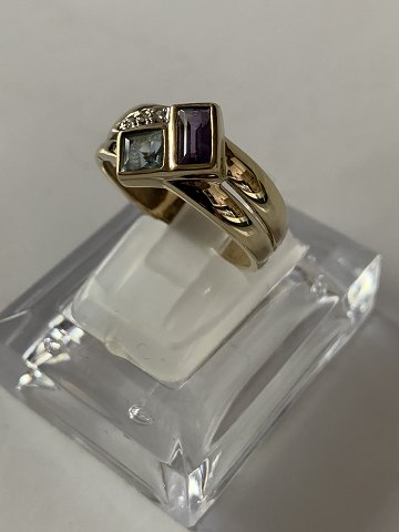 Gold ring in 14 carats, stamped 585, size 55. Diamonds/Amethyst/
Topaz