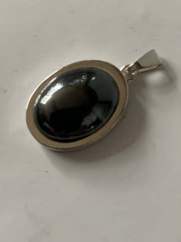 Pendant in silver with inlaid blood stone