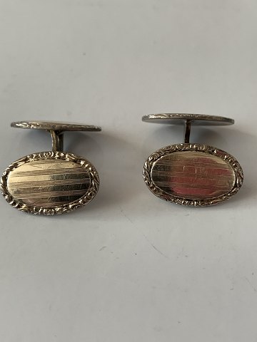 Gilded cufflinks for men, in a vintage look.