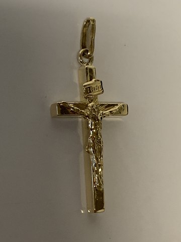 Gold cross in 14 carat gold, and with beautiful details.