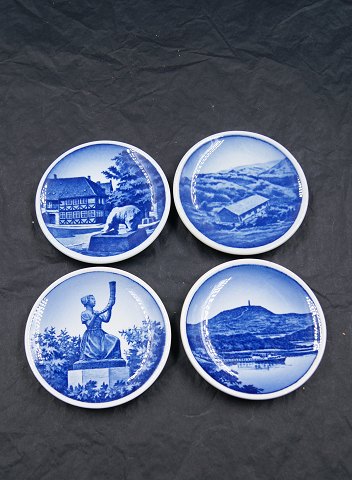 4 Plaques or mini plates from Royal Cph. & Aluminia, with motifs from Denmark.