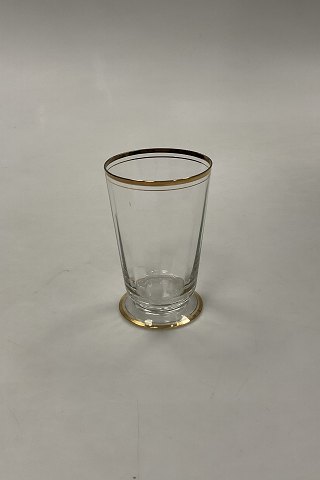 Holmegaard Ida Sodavandsglas / Vandglas med guld på stilk, rand og fod.