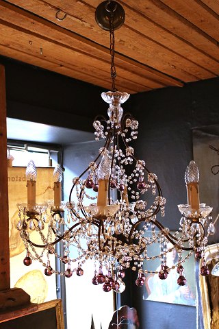 Old French prism chandelier, decorated with violet glass drops and lots of clear 
glass chains...