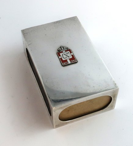 Georg Jensen. Large silver match holder with king