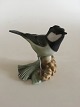 Heubach Figurine af Grøn Spurvefugl på Kogle