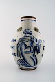 Unique Royal Copenhagen Jais Nielsen ceramic vase.
Biblical motives. Dated 1957.