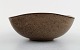 Helge Østerberg: Ceramic bowl in speckled glaze, interior in dark blue.