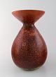 Accolay, French ceramic vase. red glaze, stylish design.
Stamped. 1950/60 s.