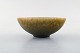 Sven Wejsfelt for Gustavsberg Studio Hand. Unique bowl in glazed ceramics. 1989. 
Beautiful glaze in green and yellow shades.